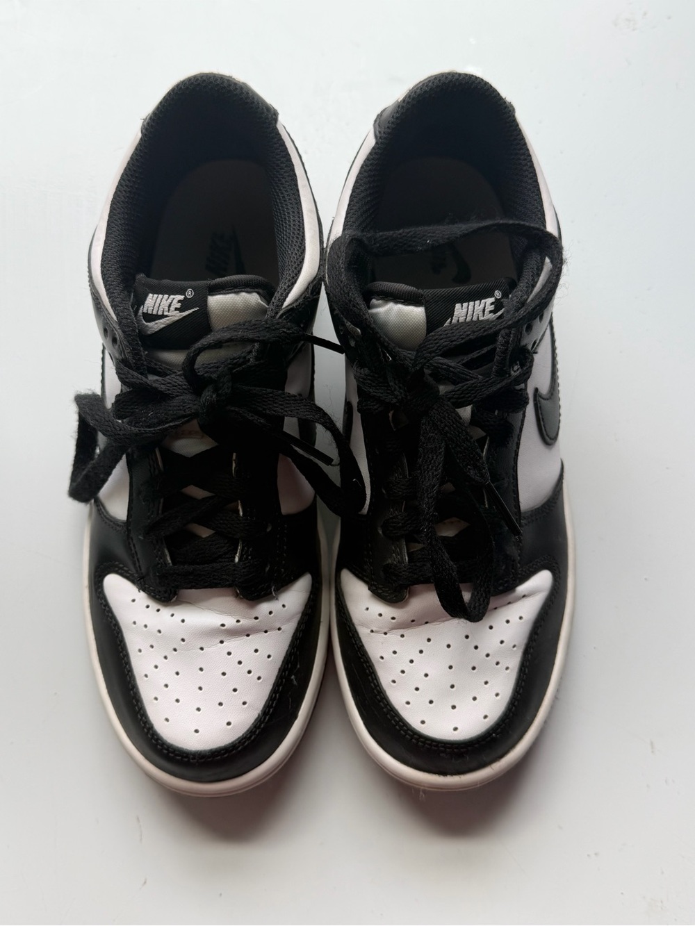 Nike 5.5Y Black and White Low-Top Sneakers with Icon Swoosh